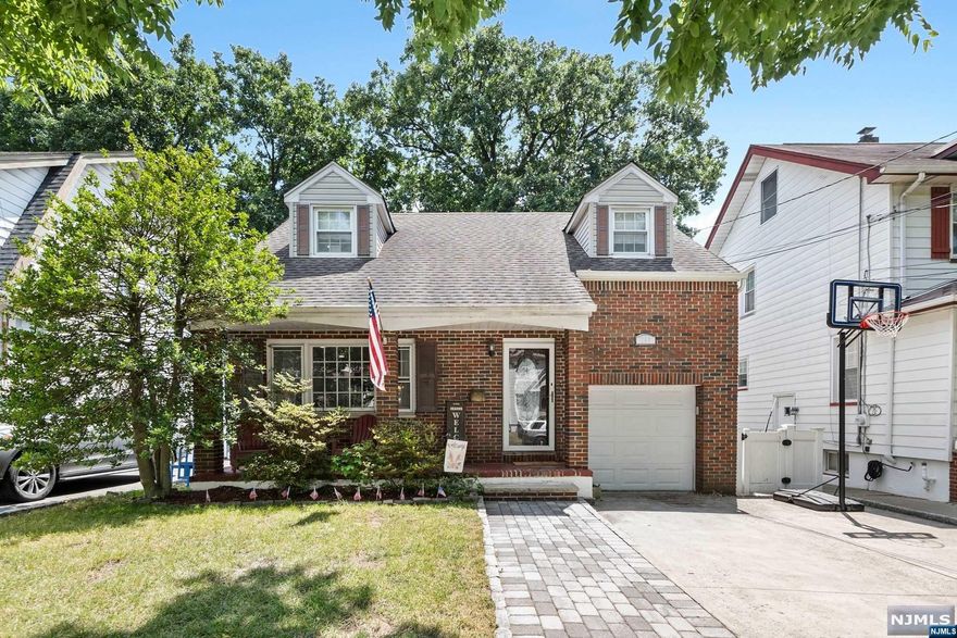 ***HIGHEST AND BEST DUE BY TUESDAY 7/2 at 5pm*** This stunning 3-bedroom, 1.5-bath home has been recently renovated and is in excellent condition. Ideally located, it's within walking distance to the local elementary school, NYC transportation, and Route 80. The first floor boasts a welcoming entry foyer, a spacious living room, a dining room with sliding glass doors leading to the back deck, a beautifully renovated kitchen, and a half bath. Upstairs, you'll find three bedrooms and a full bath. The fully finished basement includes a rec room, office, and laundry room. The backyard is generously sized, fully fenced, and perfect for entertaining, featuring a large deck. Additional amenities include central air, beautiful hardwood floors throughout, ample parking in the large driveway, and a one-car attached garage. This home is a must-see and won't last long!