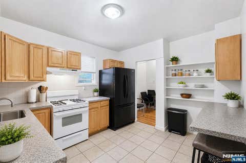 Photo of 17 Highland Terrace, Irvington, NJ 07111 (MLS # 26025489)