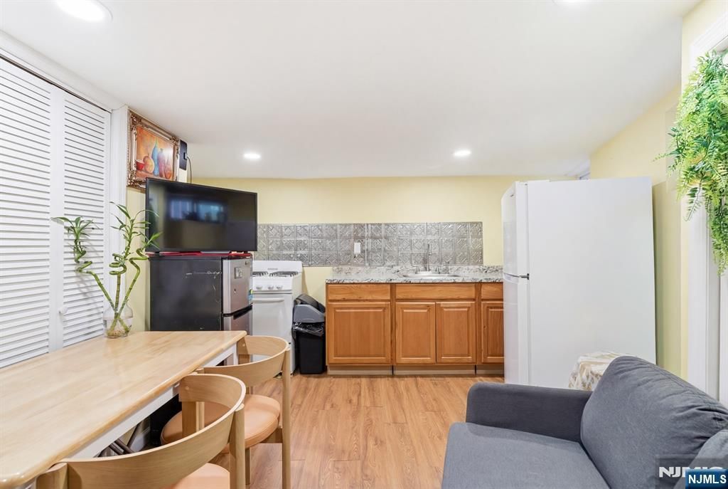 Photo of 61 Cutler Street, Newark, NJ 07104 (MLS # 26009793)