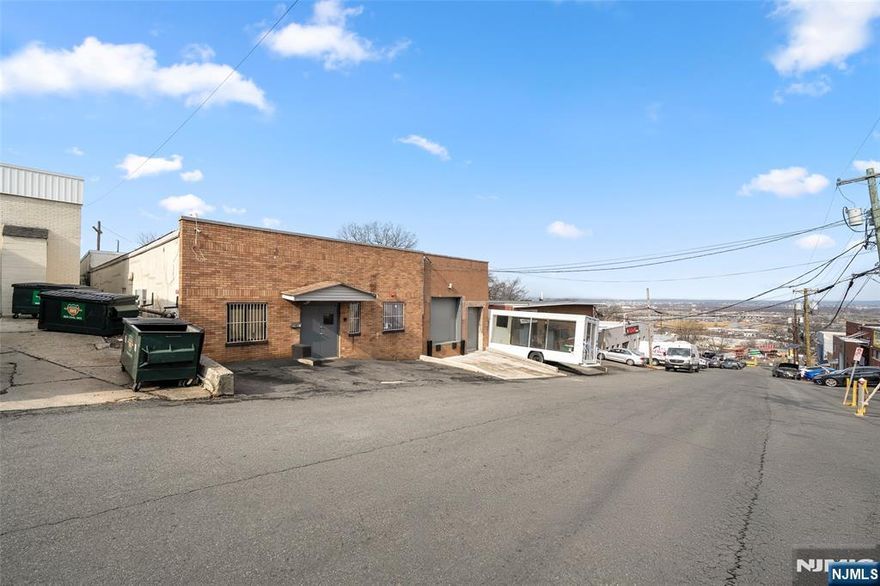 PRIME OPPORTUNITY TO OWN A VERSATILE WAREHOUSE IN THE HEART OF FAIRVIEW, NJ, OFFERING QUICK AND EASY ACCESS TO NEW YORK CITY AND ALL MAJOR HIGHWAYS. THIS ALL-BRICK BUILDING FEATURES A SPACIOUS OPEN LAYOUT WITH VERY HIGH CEILINGS, MAKING IT IDEAL FOR A WIDE RANGE OF COMMERCIAL USES INCLUDING STORAGE, DISTRIBUTION, LIGHT MANUFACTURING, SHOWROOM SPACE, OR CREATIVE BUSINESS OPERATIONS. THE PROPERTY INCLUDES A DRIVE-IN LOADING DOCK FOR SEAMLESS LOGISTICS, ALONG WITH A DEDICATED OFFICE AREA FOR ADMINISTRATIVE USE. A BUILT-IN CUSTOM KITCHEN ADDS CONVENIENCE FOR EMPLOYEES OR DAY-TO-DAY OPERATIONS. THE EXPANSIVE INTERIOR ALLOWS FOR FLEXIBLE CONFIGURATIONS TO SUIT YOUR SPECIFIC NEEDS. ADDITIONAL HIGHLIGHTS INCLUDE ON-SITE FRONT PARKING, EXCELLENT ACCESSIBILITY, AND STRONG POTENTIAL FOR A VARIETY OF BUSINESS TYPES. WHETHER YOUâ€™RE AN INVESTOR OR AN OWNER-USER, THIS PROPERTY OFFERS ENDLESS POSSIBILITIES TO CUSTOMIZE AND MAXIMIZE ITS USE. A RARE OPPORTUNITY TO SECURE A HIGHLY FUNCTIONAL INDUSTRIAL SPACE IN A PRIME BERGEN COUNTY LOCATIONâ€”PERFECT FOR VIRTUALLY ANY BUSINESS LOOKING TO GROW AND THRIVE.