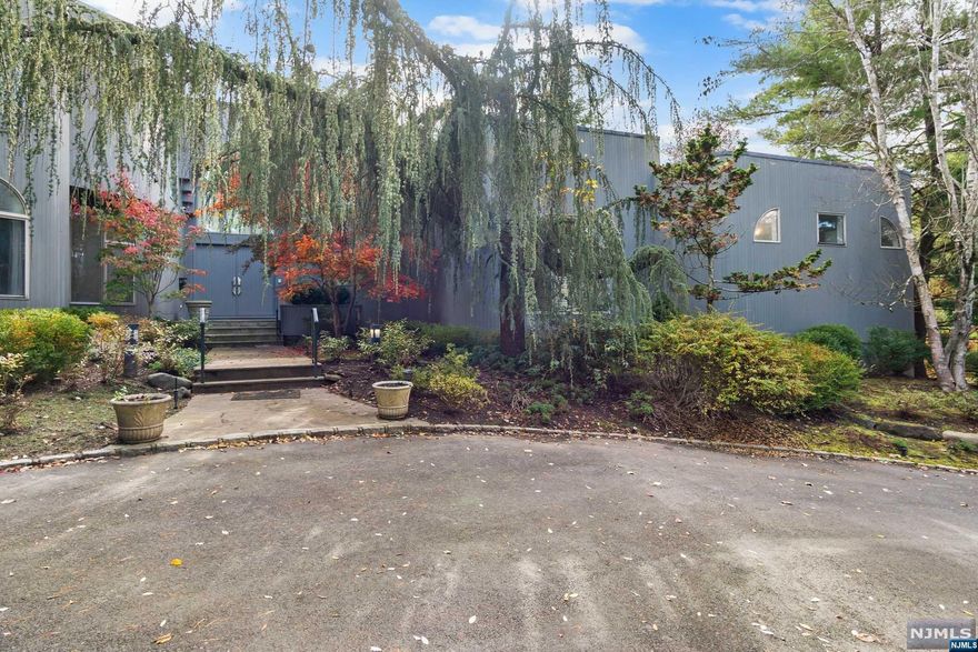 Lovingly maintained 5 BD, 4BA, 2 1/2BA home w 8,700 +/- sf of finished living space on 3 floors. This classic Chestnut Hill expanded Contemporary is tucked away on a private .92 acre quiet cul-de-sac lot w backyard oasis. Spacious screened in porch overlooks in-ground heated pool w electric cover. Enter enormous 2 story foyer w marble floors, custom amenities & decorative details. 1st floor is home to 3BDs, PR, formal LR w FP & wet bar. Elegant DR, gourmet Kitchen w center island w cook top, Jenn air grill, 2 DWs, Sub-Zero refrigerator/freezer & access to the spacious FR w built ins. The luxurious Primary Suite includes BA, jetted tub, 2 commodes, steam shower, 2 walk-in closets & adjoining sitting room/office. The 2nd ensuite BD houses a walk in closet & spacious Bath & sitting room. 3rd BD w adjoining full BA & Laundry w pantry; 4-car garage. 2nd Floor is home to 2 generous BDs w walk-in closets & full BA. Full Basmnt w Rec Room, sauna, golf driving range, work out room & 1/2 BA