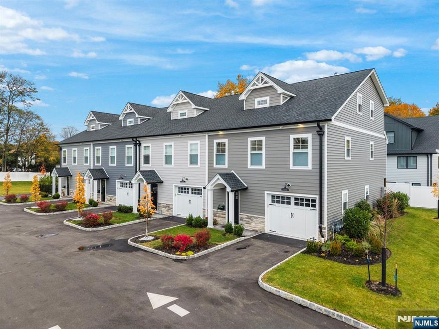 14 Mechanic St- END UNIT, BUILT 2024 to perfection. 3-bedroom luxury living at its finest all in the center of downtown Ramsey. Featuring a primary bedroom with custom moldings, built in closets, and a chic full bath, Move right in and enjoy nearly $30K in thoughtful upgrades that make this Ramsey home truly shine. Featuring new under-cabinet lighting, custom blinds (including garage), and a washer/dryer with 5-year warranty, every detail has been elevated. Enjoy a fully conditioned water system, new shower fixture, attic and storage flooring. A new deck awning creates the perfect shaded entertaining space, while modern hardware and finishes add sophistication throughout. Ideally located near Ramseyâ€™s vibrant downtown, shopping, dining, and NYC transportation, this home combines luxury living with comfort and convenienceâ€”ready for its next discerning owner to simply unpack and enjoy.