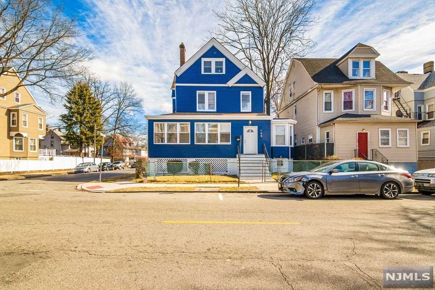 Welcome to your dream home! Large living spaces, spacious bedrooms, ample storage & much more. Walk in to an enclosed front porch, wrapping around the side of the home, then through the french door into your entryway. The newly renovated home is just awaiting your personal touch. The kitchen is modern, bright, with new stainless steel appliances. A large living room, dining room & study on the first floor will give everyone space. Up the stairs is three bedrooms with wonderful closet space, and a full bath. The attic has two more bedrooms, and a separate toilet & shower. Outside, you have a grass yard, along with a huge parking lot that will fit all your family & guests. No circling the block for parking anymore. Schedule your showing today, this spacious home will not disappoint.