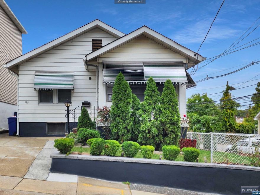 Cute as a button! This adorable, 2 bedroom ranch is just waiting for you to move in. Enter through the enclosed porch or stop for a minute and relax. Once you enter the front door, the living room and dining room combo feels open and spacious. The new kitchen and appliances makes this home even more special. Two bedrooms and a full bath complete this floor. The basement is large and open giving you the ability to use your imagination and create your own space. Features of this home include central air, newer flooring, updated electric, and so much more. ***Welcome Home***