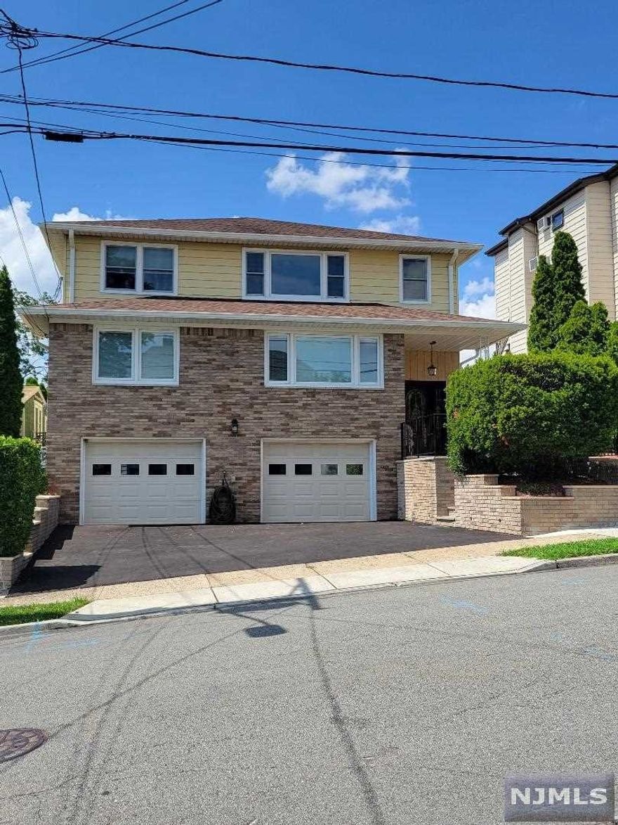 Pride of Ownership & Wonderful Curb Appeal! This beautiful, Large 2 Family House, has been updated & ready to move in! Perfect for resident owner who would like additional income or for investor. Located in a quiet neighborhood located near all shopping, transport, houses of worship, & Rt 17!