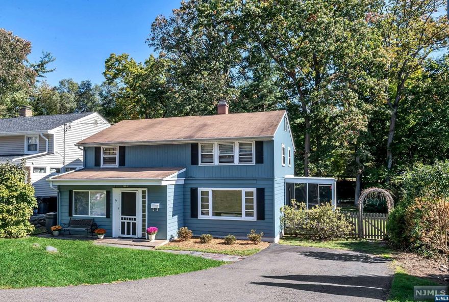 Entertain in style or relax with ease in this immaculate Colonial style home. This handsome 8 room residence is set within the Traphagen school district offering 4 generous sized bedrooms, 1 full and 1 half baths, updated kitchen/granite, formal dining room with entry to screened-in-porch, family room with stained glass window, laundry room with entry to yard, and hardwood floors. Crowning this residence is the well-manicured grounds with mature trees and perennial gardens. Adding to the serenity, is a deck, perfect for outdoor dining and relaxing. The yard offers wonderful areas for children to play safety while enjoying the extensive property. Experience the Country ambiance while being advantageously located to NYC transportation, schools, shopping & major highways, Come make this home yours today..