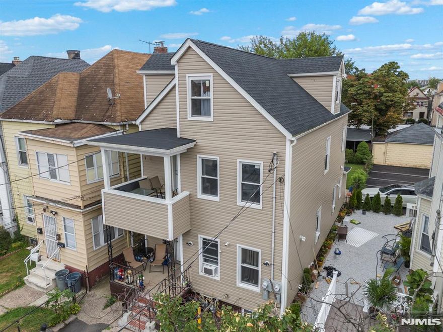 Welcome to this beautifully renovated multi-family home in the heart of Passaic, updated from top to bottom in 2023 with a brand-new roof, HVAC systems, and utilities for modern comfort and efficiency. Both units are designed as duplex-style layouts, offering spacious living and flexibility for tenants or extended family. The property also includes two private parking spots and a backyard, perfect for relaxation or entertaining. A turnkey investment opportunity or ideal owner-occupant property, this home combines style, functionality, and convenience.