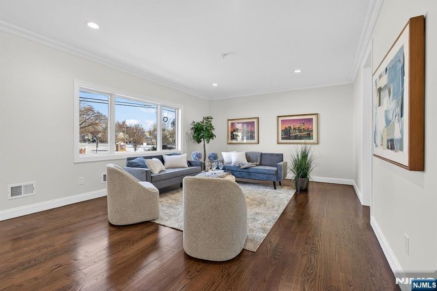 WWelcome to this stunning Fair Lawn side-hall Colonial completely gutted, expanded, and rebuilt to feel like brand-new construction. This bright and sunny home is filled with natural light, featuring an open layout, modern finishes, and thoughtfully designed spaces that make everyday living feel relaxed and comfortable.This home offers 5 spacious bedrooms and 3.1 beautifully finished bathrooms, including a serene primary suite with generous closet space. Upstairs laundry adds the convenience today's buyers love, while spacious closets throughout provide incredible storage.Enjoy year-round comfort with 2-zone heating and central air, plus peace of mind upgrades including a full sprinkler system. The finished basement offers valuable additional living space perfect for a gym, office or guest suite.Step outside to a fenced-in yard, ideal for entertaining. Additional highlights include an attached garage and a prime location close to public transportation, shopping, and houses of worship.Just imagine making this gorgeous home your own where modern style meets smart functionality, in one of Fair Lawn's most desirable neighborhoods. Simply move in and enjoy.