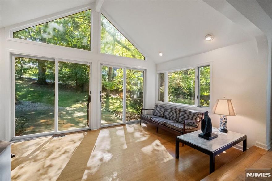 Hereâ€™s a rare opportunity to own in Tenaflyâ€™s prestigious East Hill! This 3,300+ sq. ft. residence rests on a massive 27,000 sq. ft. corner lot, treasured by the same family since it was built. With 6 bedrooms and 3.5 baths, the layout offers great bones, spacious rooms, and unique features including a sunroom with patio access, an open staircase uniting three floors, and a large primary suite with dual closets, Jacuzzi, sauna and separate shower. Additional highlights include a walkout basement, two-car garage, oversized windows with lush views, two-zone heating/cooling and sprinkler system. Located near top-rated schools, a vibrant town center and minutes to the GW Bridge, the property blends suburban tranquility with commuter convenience. Offered as-is with tremendous potential. Bring your vision. Prime East Hill lots like this are rarely available!