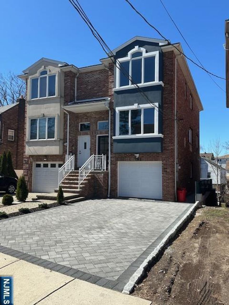 Welcome to 795 Fairview Ln. This townhouse has been completely renovated and features a bright and airy layout, along with a brand-new Trex deck and a spacious backyard perfect for family events. The entry foyer leads to a living room and a dining room, both of which feature custom molding. The open kitchen features all-new stainless-steel appliances, a water filter system, brand-new cabinetry, and a breakfast area with access to a deck. 2nd level offers a large master bedroom with a full bath, built-in closets, two additional bedrooms, and another full bath. The lower level features a generously sized family room/play area or office, as well as a full bath. Access to the backyard and epoxy-finished garage is from this level. 3-zone heat with a Nest thermostat, new central air conditioning, central vacuum, skylights, and a great neighborhood! A walk to NYC transportation, schools, shopping, and house of worship. Great location and a place to live!