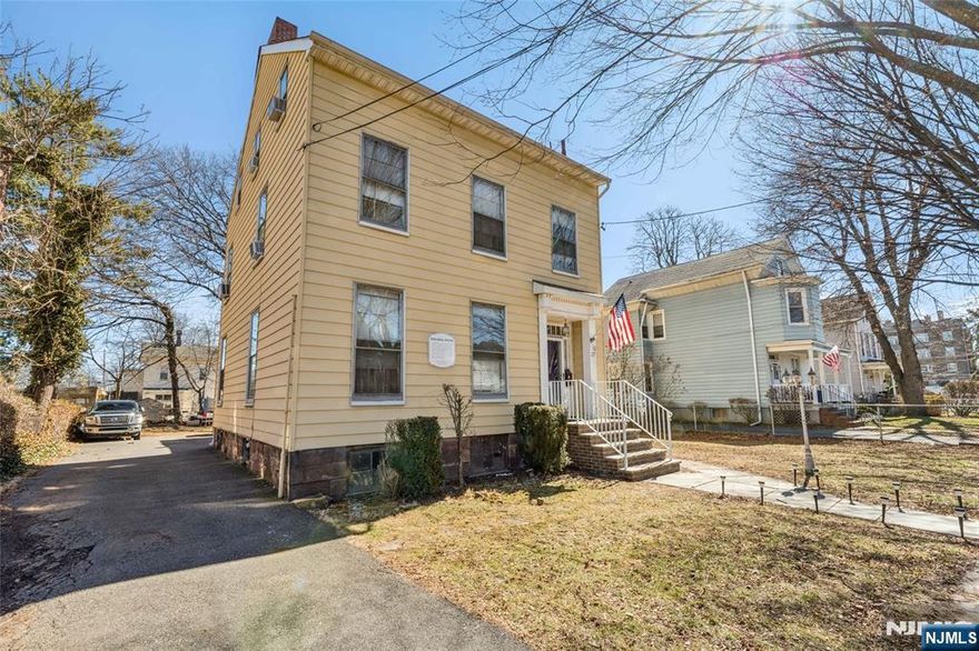 Welcome to this beautifully preserved historic Colonial home built in 1854, offering timeless character and exceptional potential. Featuring 13 spacious rooms, 3 bedrooms, and 1.5 baths, this unique property provides abundant space and flexibility for todayâ€™s lifestyle. Inside, youâ€™ll find classic architectural details including hardwood floors, tall ceilings, and multiple fireplaces that showcase the homeâ€™s rich history and enduring charm. Several additional bonus rooms offer endless possibilitiesâ€”perfect for creating extra bedrooms, a home office, playroom, library, studio, or guest space. The home also features a large enclosed rear deck, ideal for entertaining, relaxing, or enjoying gatherings year-round. Situated on a wide lot with ample parking, the property offers both space and convenience rarely found in a downtown location. Located in the heart of downtown Bloomfield, this home is just moments from parks, shopping, restaurants, schools, and public transportation with easy access to NYC, making it a fantastic opportunity for commuters and those seeking a vibrant community setting. This historic gem is being sold in as-is condition, offering a wonderful opportunity for buyers to restore, update, and make it their own while preserving its classic character. Donâ€™t miss the chance to own a piece of Bloomfield history with unlimited potential.