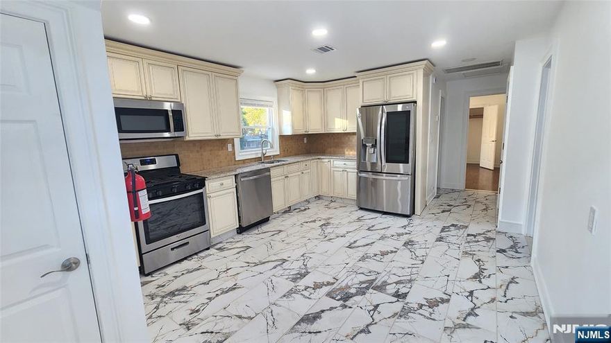 Discover a bright and updated apartment on the 2nd floor of a charming two-family home. This spacious unit features 2 bedrooms, a full bath, and a welcoming living room with an eat-in kitchen boasting granite countertops and all new appliances. Enjoy the comfort of central air and hot air heating, complemented by beautiful hardwood floors. Nestled in a desirable location close to parks, schools, shopping, and transportation, this home offers convenience and lifestyle. Pets conditional, street parking only. Ideal for those seeking a peaceful, owner-occupied setting. Credit check and interview required. Don't miss this opportunity to live in a nice neighborhood with close driving proximity to major highways. Contact us today for a confirmed appointment! Important: pets negotiable with a pets fee.