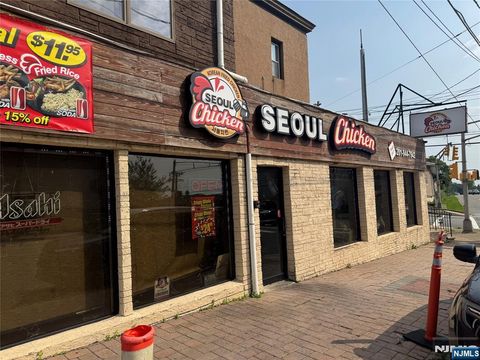 Photo of 417 E Brinkerhoff Avenue, Palisades Park, NJ 07650 (MLS # 25034816)