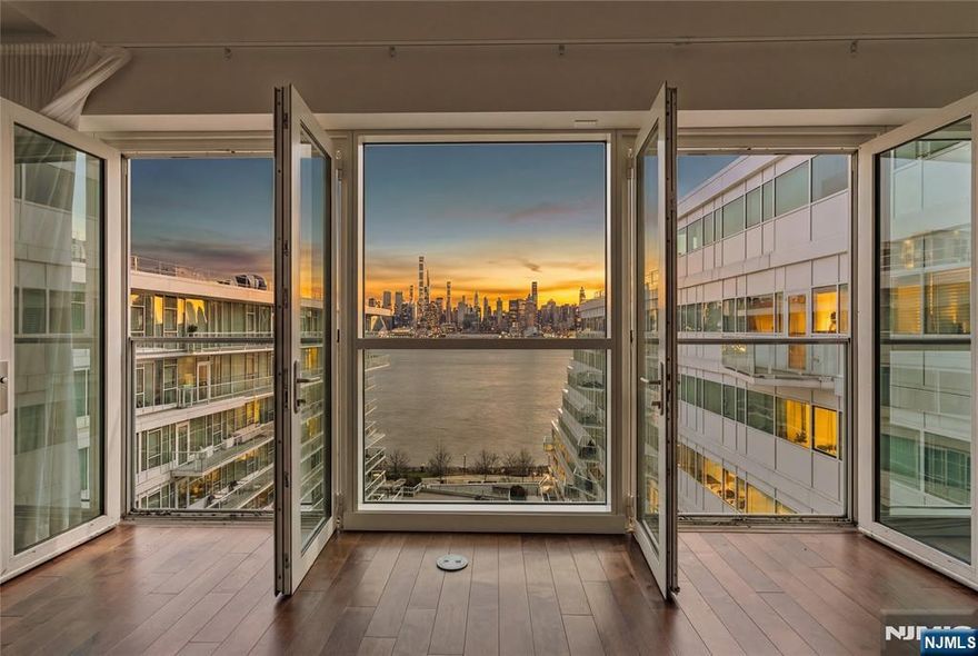 Enjoy waterfront living at its finest in Residence #1010 at AVORA â€” a spacious 1504-sq-ft home showcasing sweeping east-facing Hudson River views and refined modern finishes throughout. This thoughtfully designed residence features wood flooring, quartz countertops, contemporary cabinetry, and premium stainless steel appliances. The primary bath offers a spa-like experience with an oversized soaking tub and high-end fixtures. Enjoy AVORAâ€™s full suite of luxury amenities, including 24-hour concierge, fitness center, sports simulator, multiple resident lounges, and a stunning designed pool deck with grilling areas. Conveniently located just steps from the ferry, light rail, and NJ Transit, providing an easy commute to Manhattan. Unit comes with 2 parking spaces and a storage unit!