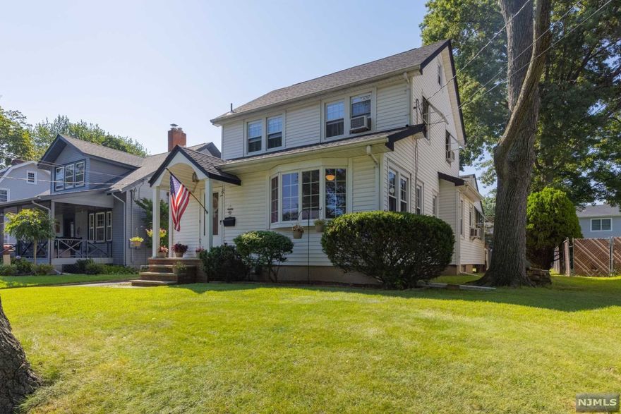 Classic colonial charmer with original woodwork throughout. Featuring entry vestibule with powder room, sitting room with beautiful bay window, formal living and dining rooms, large eat in kitchen. Three bedrooms, walk up attic, rear screened in porch, detached garage & level yard. Convenient commuter location just 3 blocks to train. Close to shopping restaurants, town parks and recreation areas. New roof March 2021, includes home warranty.