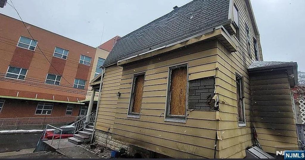 Photo of 176 Madison Avenue, Irvington, NJ 07111 (MLS # 26007049)