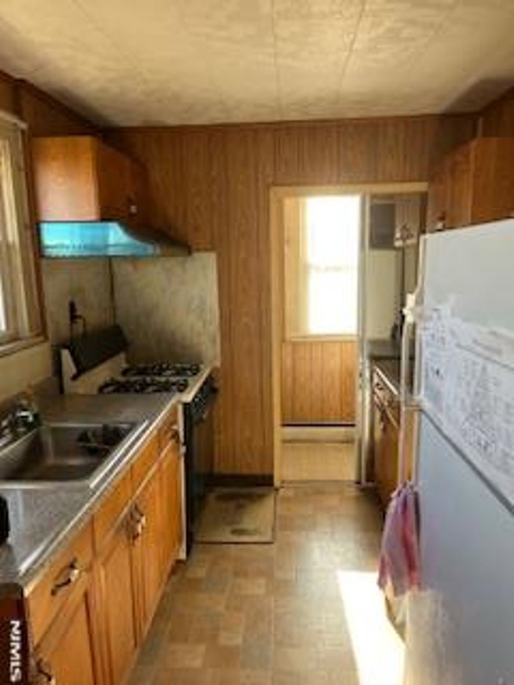 Photo of 1 Woodland Avenue, Little Ferry, NJ 07643 (MLS # 25041532)