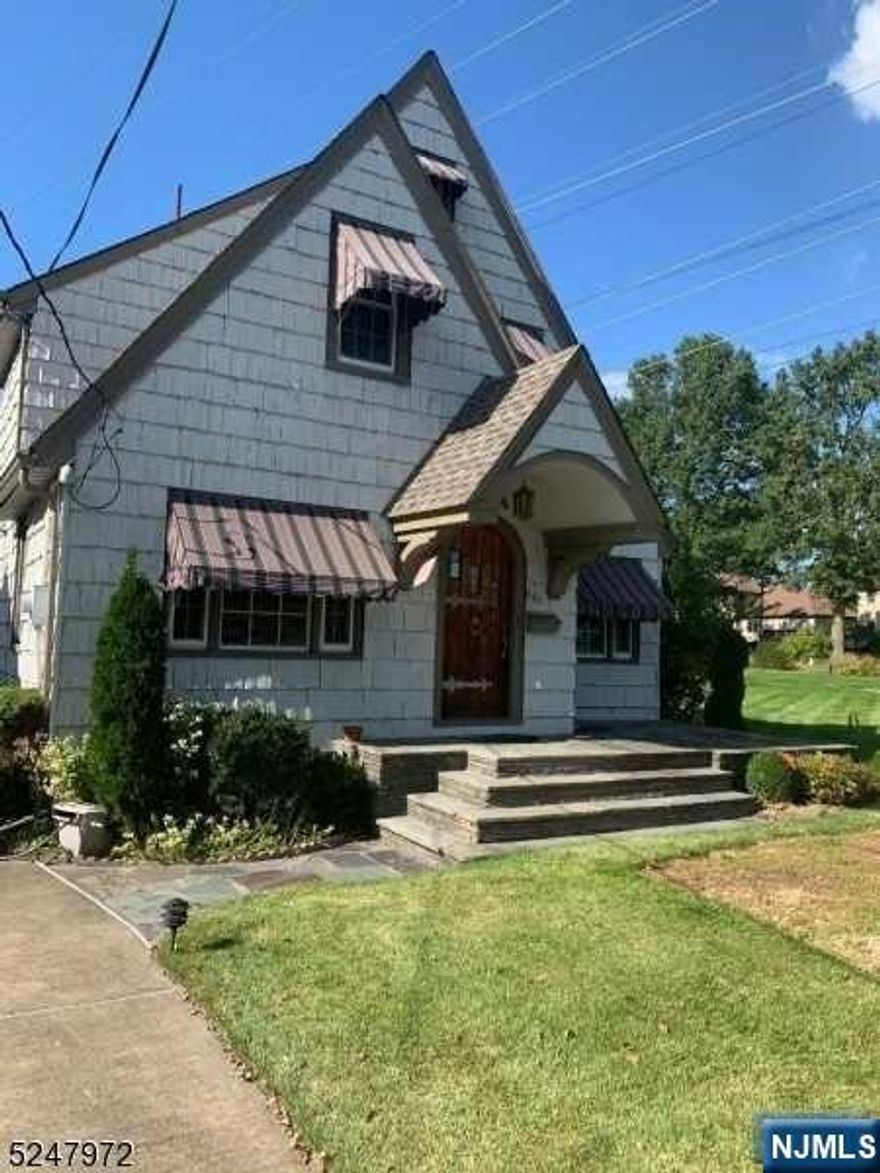 S HOME IS DEFINITELY A WALK BACK IN TIME WITH ALL IT'S NATURAL WOOD TRIM! AND WOOD FLOORS!