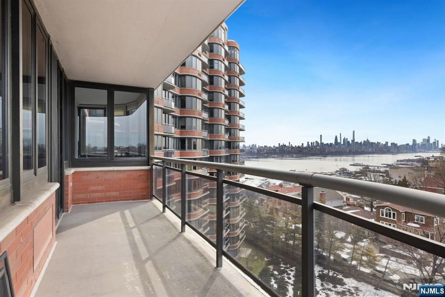 Spacious 2BR Condo with Manhattan Skyline & Hudson River Views Experience breathtaking Manhattan skyline and Hudson River views from this expansive residence at 100 Carlyle Drive. Unit 9DS is a bright and spacious two-bedroom, 2.5-bath condominium offering approximately 1,572 square feet of living space. Large windows flood the home with natural light and frame incredible city views, while the thoughtfully designed layout provides comfortable living and entertaining areas. The kitchen has been recently renovated, and hardwood floors run throughout the residence. Step out onto the private balcony overlooking the city, an ideal place to relax and enjoy the skyline. The primary suite features generous closet space and an en-suite bath, while the second bedroom offers flexibility for guests or a home office. An in-unit washer and dryer provides added convenience. Residents enjoy a full-service building with 24-hour concierge, outdoor pool, fitness center, library, and valet parking. Located just minutes from Manhattan, this home combines space, views, and convenience in one of Cliffside Parkâ€™s most desirable buildings.