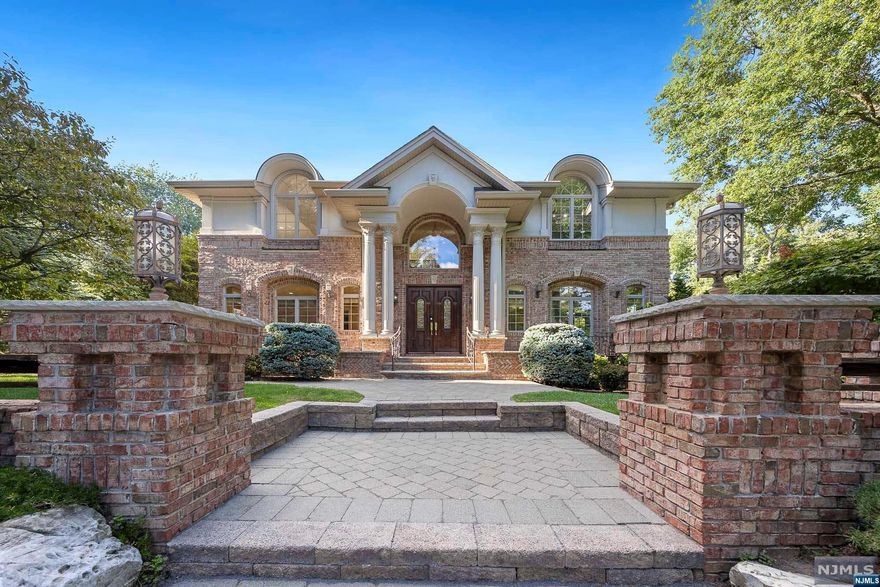 Stately French Manor custom built with exquisite craftsmanship and stunning architectural details, ideally situated in one of NJs most desirable towns. Its grand portico leads to a double height entrance with palatial front to rear marble foyer. Gourmet kitchen featuring Sub Zero/Viking appliances center island and custom cabinetry, radiant heating, Escape, to a lavish primary bedroom retreat w/sitting area, fireplace, walk in closet, spa like bathroom and private terrace overlooking the manicured grounds. 4 additional bedrooms and 4.1 baths. Walking distance to Blue Ribbon Schools and Convenient location for commuters. The VIRTUAL TOUR link for this listing contains an enormous amount of relevant information including a comprehensive video tour with hidden features & room dimensions, written description, additional photos, floor plans, and a complete interactive 3D model of the home.