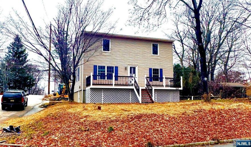 Welcome to Your Dream Home - A Beautifully Renovated 3-Bedroom, 2.5-Bath home in Picturesque West Milford This newly updated two-story house offers the perfect blend of modern updates and serene surroundings. Boasting 3 spacious bedrooms and 2.5 baths, this home has been meticulously redesigned to provide comfort, style, and convenience. From top to bottom, every detail has been thoughtfully upgraded, so you can move right in. The main floor features a stunning master suite, offering both privacy and luxury. The spacious, walkout basement provides a separate entrance that could easily be converted into a home office. Step outside to your private deck and enjoy your vast detached workshop (approx. 300 sq ft) With a brand-new septic system installed, you can rest assured that this home is ready for years of worry-free living. Don't miss out on the opportunity to make this West Milford home your own.