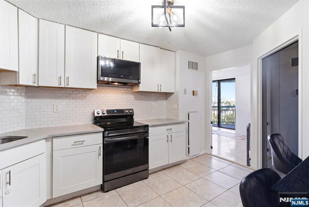 831 Harmon Cove Tower