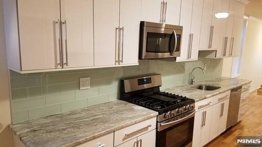 Photo of 1208 67th Street, North Bergen, NJ 07047 (MLS # 25040583)