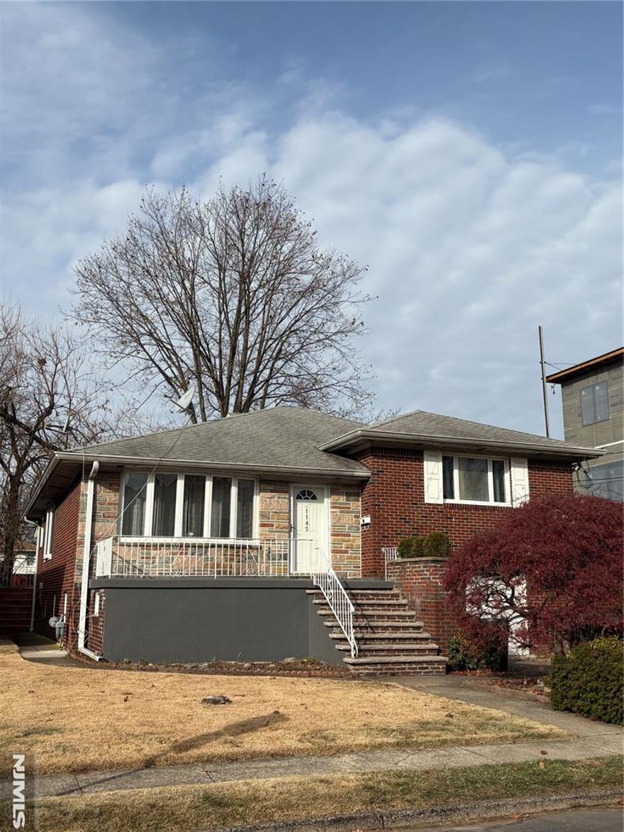 This beautifully renovated and highly desirable 3 bedrooms and 3 bathrooms split-level home is located on one of the finest streets in Fort Lee. The home is cozy, bright, and inviting, benefiting from abundant natural sunlight throughout the day thanks to its desirable east and south exposure. The property features a solid 100% brick exterior and gleaming hardwood floors throughout. The modern eat-in kitchen is equipped with LG appliances, walk-out to the deck, and the washer/Dryerâ€”located on the 1st floorâ€”is in like new condition appliances. Heating is provided by high-quality cast-iron baseboard radiators, offering exceptional warmth and comfort during the winter. The fully finished basement includes a full bathroom, separate entrance, Family rooms, a summer kitchen, and an oversized walk-in closet. Oversized 2 Car Garage. The home is professionally landscaped and conveniently situated within walking distance to Elementary School #4, parks, NYC transportation, and shoppings. This home is filled with warm and charm, creating an atmosphere that instantly puts you at ease.