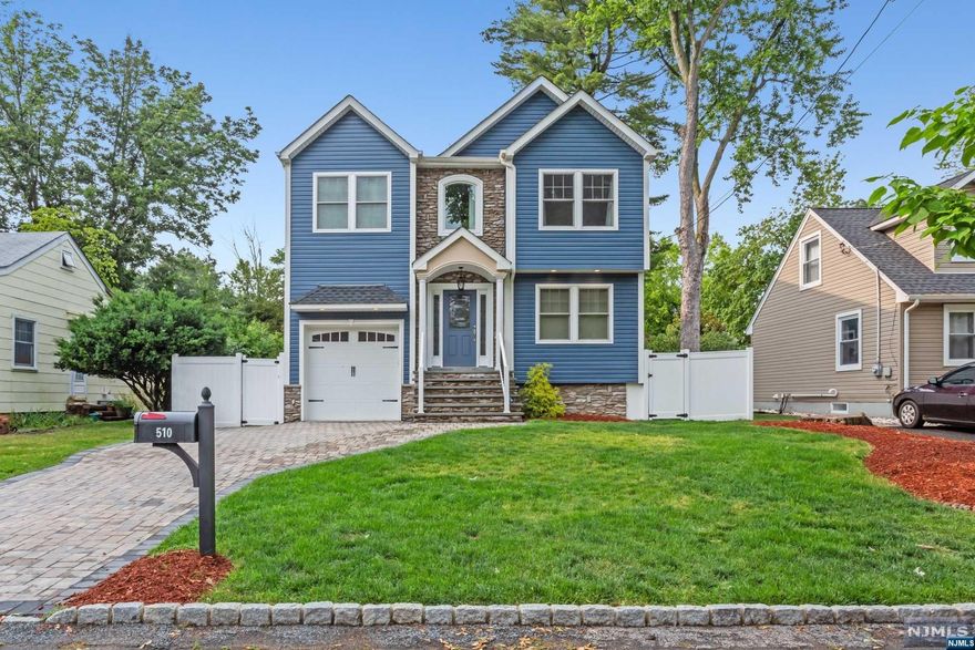 Come and See this custom four year young constructed home in the desirable town of River Vale. The entrance features high ceilings and beautiful new hardwood floors. From the expansive living and entertaining areas to the new fenced in landscaped grounds with a large deck. This Colonial Home also features four bedrooms, four full bathrooms, all custom made with the best craftsmanship. This modern style kitchen has stainless steel appliances, quartz counter-tops and opens up to the dining room and living room. The over-sized master bedroom comes with a walk-in closet and a soak in tub. Full finished basement features a full bathroom, wet bar, butcher block counter tops, and a bonus room. This gorgeous home is ready for you to move right in and take advantage of this custom build and excellent craftsmanship. This town has excellent school systems and close to NYC transportation. Come and See...