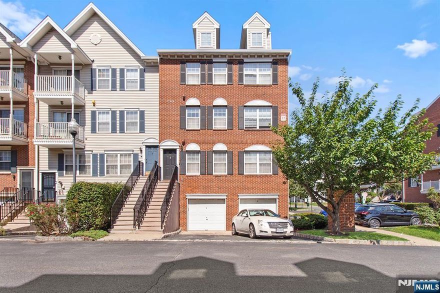 A GEM in SOCIETY HILL in Newark. Gated community. Very accessible to transportation to New York City, airport, shopping, district, schools, and parks. Three bedrooms, two full baths, office, living room, dining room, eat-in- -kitchen, newly renovated, hardwood floors throughout, one car, attached garage, 2 floors of living space. A MUST SEE!