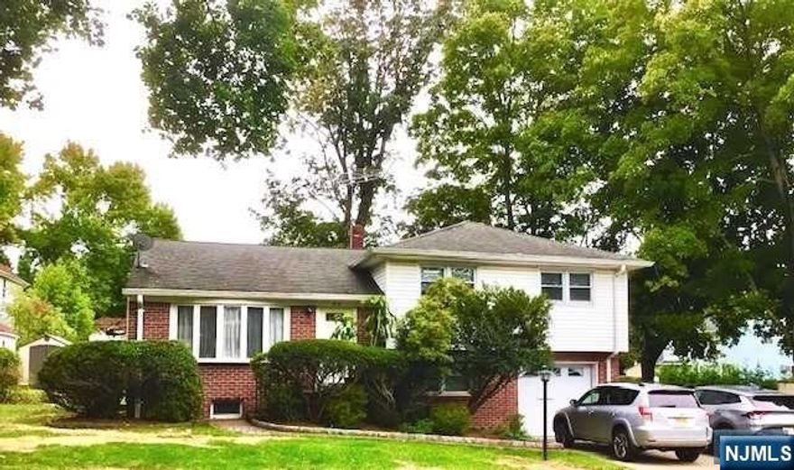 Location, location, location! Conveniently located in desirable town of Cresskill, this charming home is situated on a large corner lot on a very quiet street. 3 Bedroom 2 Full Bath, hardwood floors, newer windows and a new hot water tank. One car attached garage and paver driveway can accommodate additional 3 cars. Brand new storage shed in the expansive backyard. Cresskill is known for excellent school, close to shopping, park and easy commute to NYC! Owner is relocating, this house is sold 'AS-IS'. Wonderful opportunity to renovate or build your dream home! Don't miss this opportunity!