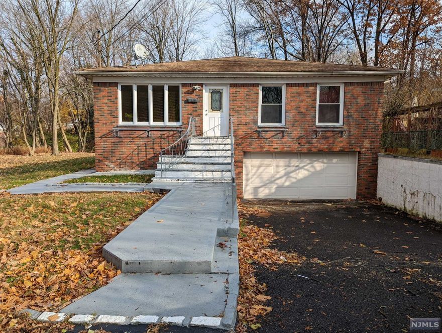 Large Raised Ranch in need of TLC in Bloomfield. End of Dead End Street. Private Setting. Total house Square Footage is about 3800 Square Feet. Main Living Floor has about 1900 Square Feet. Basement Level has about 1400 Square Feet of Living Space along with 400 Square Feet of Garage Space. 4 Bedroom 3 Full Baths. Plenty of Storage/Closet Space throughout the home. Large Living Room & Dining Room, Eat in Kitchen, Master Bedroom with En Suite. All Major Systems in good working order. Home needs a good cleaning and as little or as many updates as you would like to make it your own.