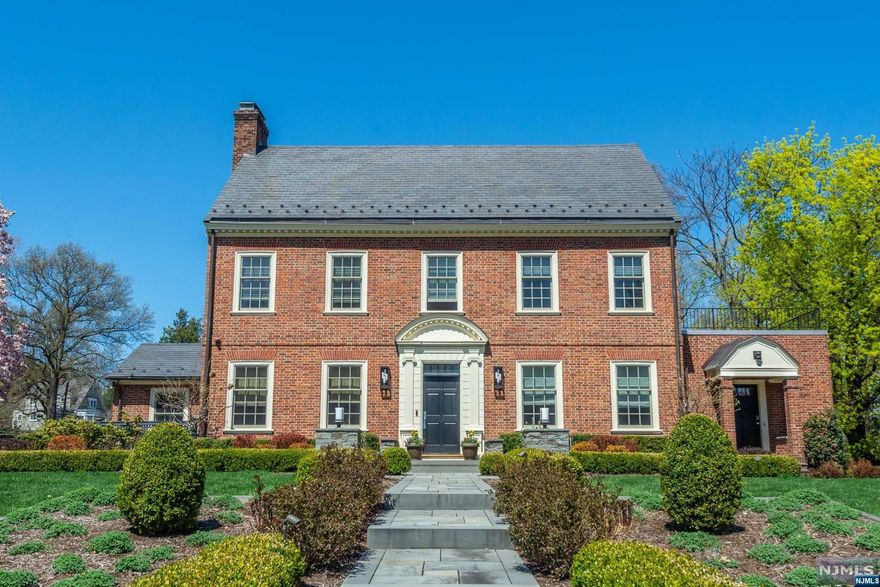 This iconic Francis Nelson colonial has been renovated with sensitivity & style. The large level lot has been landscaped & lighted to display its beauty.The LR, FR,2 offices, bath & PR on the first floor are fitted with custom built-ins. The carefully appointed chef's kitchen with an abundance of storage stands at the ready as does the formal dining room with custom cabinetry. A private guest suite completes the first floor. The primary suite on the second floor reflects the sense of the original design. A southern exposure lights the bedroom while the luxurious bath overlooks the backyard. Two other bedrooms with ensuite bath & custom built-ins make for easeful organization. Family room/br & bath on the 3rd fl are a private hideaway. Basement gym, PR & storage complete this thoughtful renovation. Sonos sound system throughout Enjoy a summer's eve on the patio complete with fireplace & fire pit. Well water feeds the sprinkler system.