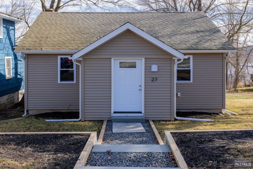 THIS IS IT!!! Your" fabulously renovated lake style home awaits in picturesque North NJ! Featuring 3 Bedrooms, 2 Baths, Eat in Kitchen w/granite countertops and breakfast bar, custom backsplash and new stainless appliances AND recessed lighting throughout! Incredible winter lake views, level backyard, Central Air, and a Detached one car garage completes the picture! New 3 BR Septic Being Installed. Beach Rights available through membership. Enjoy hiking, biking, fishing, swimming, and boating PLUS Close to year-round activities from apple picking and skiing in Warwick Come see what living the good life can be like! Enjoy year round living or weekend getaways! New septic to be installed prior to closing