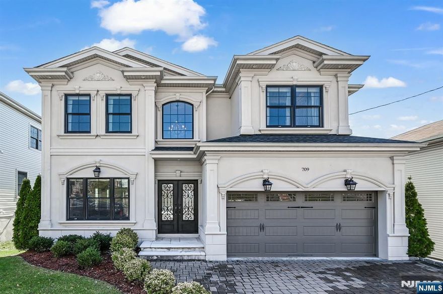 An Exquisite and Distinctive Residence: Step into an extraordinary world of elegance and refinement with this special residence boasting over 4,500 square feet of masterfully designed living space. A true showcase of luxury, craftsmanship, and thoughtful designâ€”blending timeless sophistication with modern comfort. The gracious entry foyer opens to grand formal living and dining areas, a light-filled great/family room, and a large gourmet kitchen with breakfast areaâ€”perfect for entertaining or everyday indulgence. Featuring six generous bedrooms, including a stunning primary suite with luxurious bathrooms, walk-in closets, and serene finishes that feel like a private retreat. With 4.5 beautifully appointed bathrooms, every detail is curated for comfort and style. Extraordinary design, high-end interiors, and a seamless layout elevate this distinctive home. Rarely does a residence of this caliber come to market with NYC views and 20 mins from Midtown Manhattan and walk out ground floor.