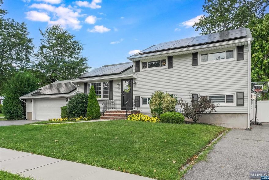 Beautifully updated home located in Rochelle Park offering convenient location,quiet neighborhood & a low-traffic street.With bright,clean interiors,the home provides 3 BRs & 2 renovated bths.Distinguished by an open floor plan highlighting a wonderful flow between rooms,the main level features sunny LR,DR & stunning renovated kitchen w/grey cabinetry topped w/quartz counters incl breakfast bar seating at the island.A SGD leads to deck & the fenced & private backyard w/plenty of room to play & entertain.Just a few steps away from the kitchen is a spacious FR. An addl room on this level offers a perfect guest rm/home office w/adjacent gorgeous full bth.The lower level is a delightful surprise w/newly remodeled rec rm,another bonus rm,laundry & storage.All 3 BRs are located on the home's 2nd level w/a lovely renovated hall bath.The 2-car attached garage offers interior entry,along w/access to the backyard.Gleaming HW floors,c/a,2 driveways for extra parking,too many updates to list!