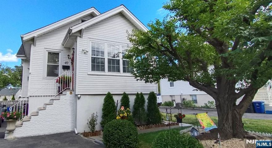 Raised Ranch Featuring First Floor Enclosed Porch Living Room , Dinning Room , Kitchen with Breakfast Nook , Bedroom , Full Bathroom Shower Over Tub , Bed Room With Walk Up Stair To Partial Finished Attic / Ideal For Storage . , Ground Level Private Side Door Entrance & Exit from living room , bedroom / with full bathroom Shower Over Tub Featuring Newer Roof & Hot Water Tank with in one year installation , Three Zones Gas Boiler , Very Close To Major Highways Route 46 , 80 , 95 , GWB ,NJ / Turn Pike , NJ / Transit Bus Stop , Excellent Move In Condition , Must See To Appreciate Pride Of Ownership & Value .