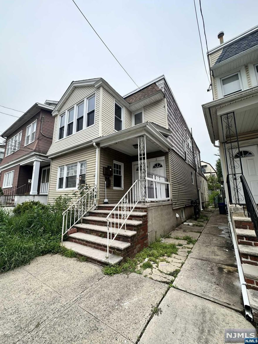 Location! Location! Beautiful 2-Family close to schools, shopping, transporation, and resturants.