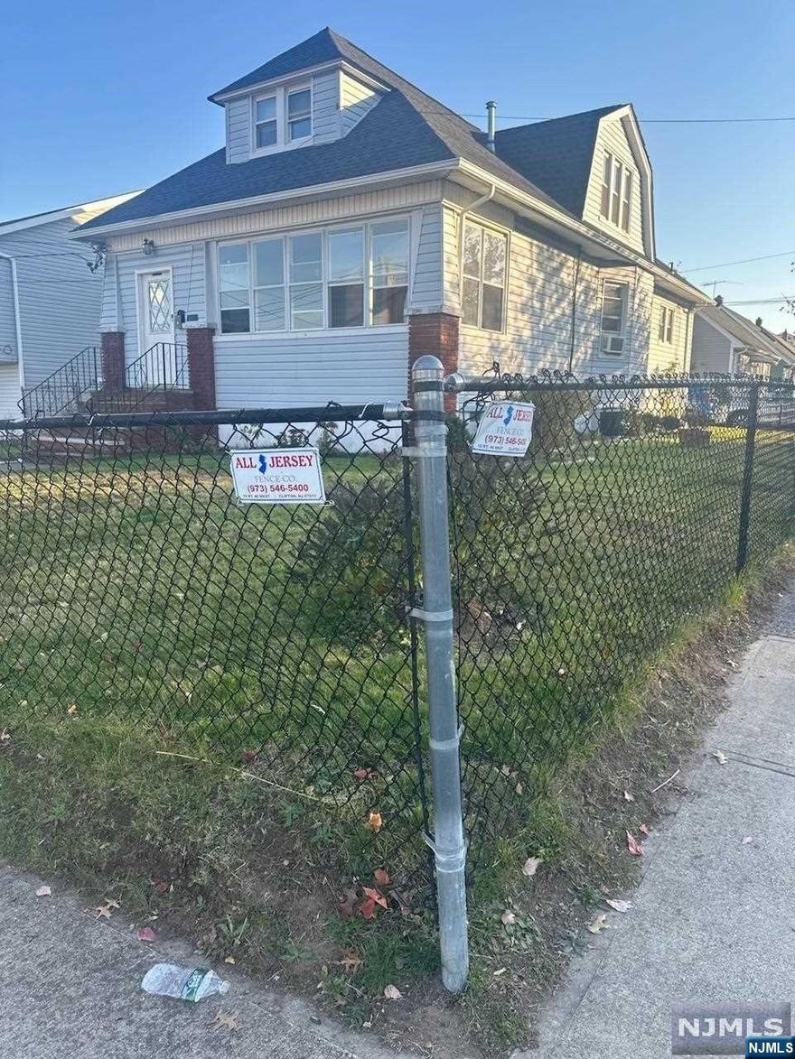 This 2 family offers a corner lot and great location. It has a 2 car garage and can hold up to 4 cars in driveway. Would be ideal for an owner occupant or as an investment property. Offers Easy Access to Major Highway and Close to Retail Shopping and Restaurants. Listing Agent Is Related To Seller.
