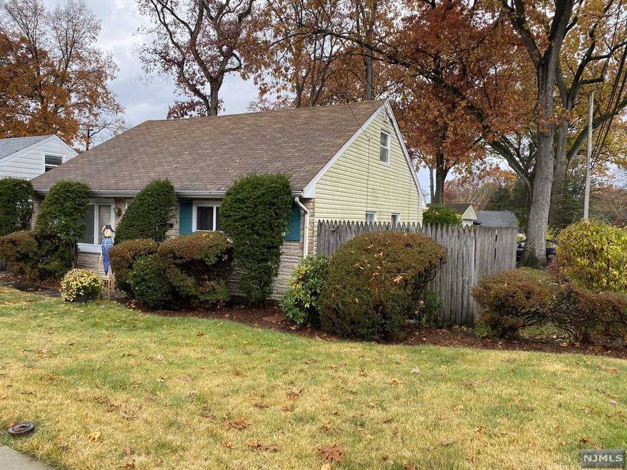 CORNER CAPE, GAS HEAT, DETACHED OVERSIZED 1 CAR GARAGE. NEWER DRIVEWAY. 1 YEAR OLD WALL AC IN LIVING ROOM. BASEBOARD HEAT ON 1ST FLOOR. 1ST FLOOR HAS A LIVING ROOM WITH DINING AREA, KITCHEN, LAUNDRY, FURNACE, FULL WALK IN BATH, 2 BEDROOMS. 2ND FLOOR HAS 2 LARGE BEDROOMS AND ROOM FOR ANOTHER BATH. NO BASEMENT. SOLD AS IS. PARKING FOR 3 CARS NOT COUNTING THE GARAGE. CHANDELIER IS EXCLUDED.