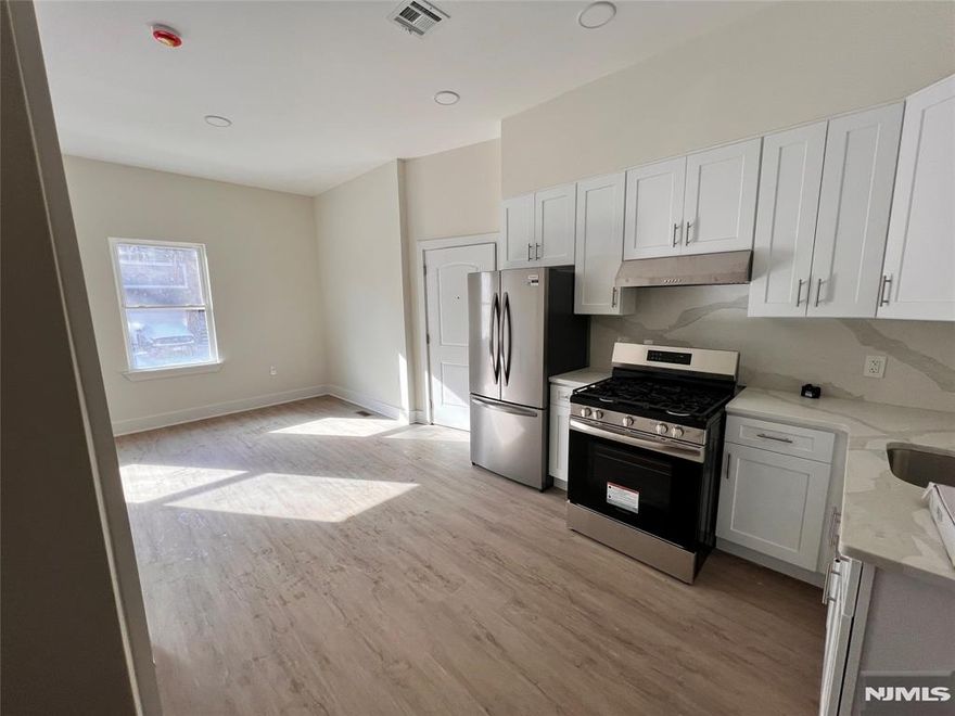 Welcome to this beautifully updated one-bedroom one-bath apartment located in Guttenberg, NJ! This unit is freshly renovated and has never been lived in, showcasing an inviting open-concept living room and kitchen space equipped with all-new, state-of-the-art appliances. The kitchen boasts gorgeous quartz countertops that add a modern touch. Enjoy the convenience of a laundry facility and a dedicated storage area in the basement. Perfectly situated near all transportation, this apartment offers a seamless commute to NYC, making it an ideal home for anyone looking for style, comfort, and accessibility.