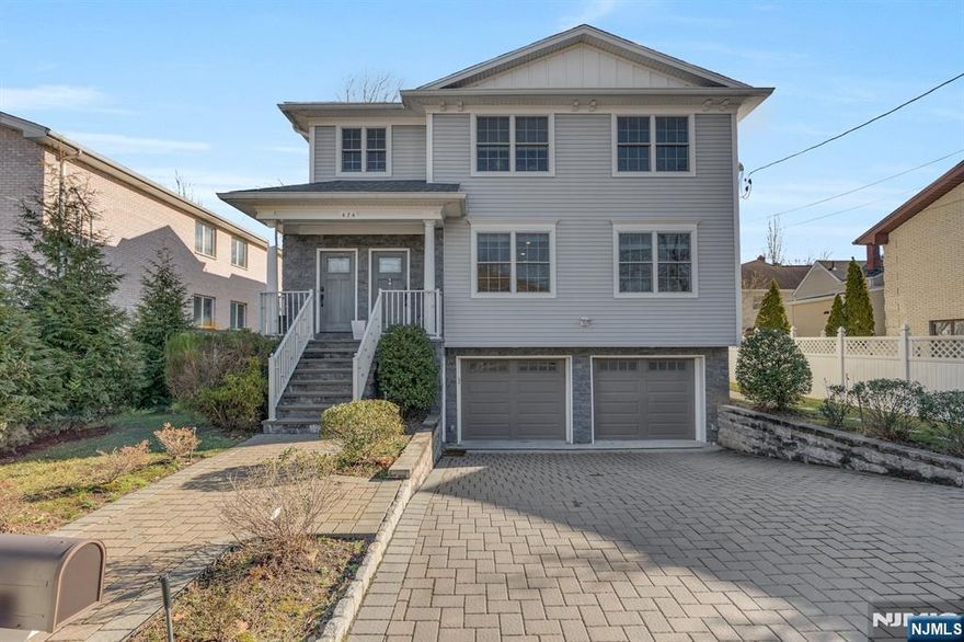 FAIRLY NEW (built in 2018) ***BEAUTIFUL 1ST FLOOR WITH BASEMENT (Separate entrance)*** OF THE TOP/BOTTOM STYLE 2-FAMILY HOUSE WITH PRISTINE, MODERN DESIGN. 1st floor features : 3 BEDROOMS, 2 FULL BATHS, DINING ROOM WITH A FIRE PLACE (gas), MODERN EAT-IN-KITCHEN WITH GRANITE COUNTER TOP & STAINLESS STEEL APPLIANCES, SLIDING DOOR TO DECK FROM EATING AREA, AND A TERRACE FROM THE MASTER BEDROOM. WASHER/DRYER IN THE UNIT. FIRST FL UNIT HAS ACCESS TO ONE-CAR GARAGE & ***Fully finished basement on ground floor has a family room or Recreation room and one full bath, access to garage and SEPARATE ENTRANCE***. 3 MINUTES TO H-MART, CONVENIENTLY LOCATED TO NY BUS,SCHOOLS,PARKS, RESTAURANTS,AND HOUSE OF WORSHIP.