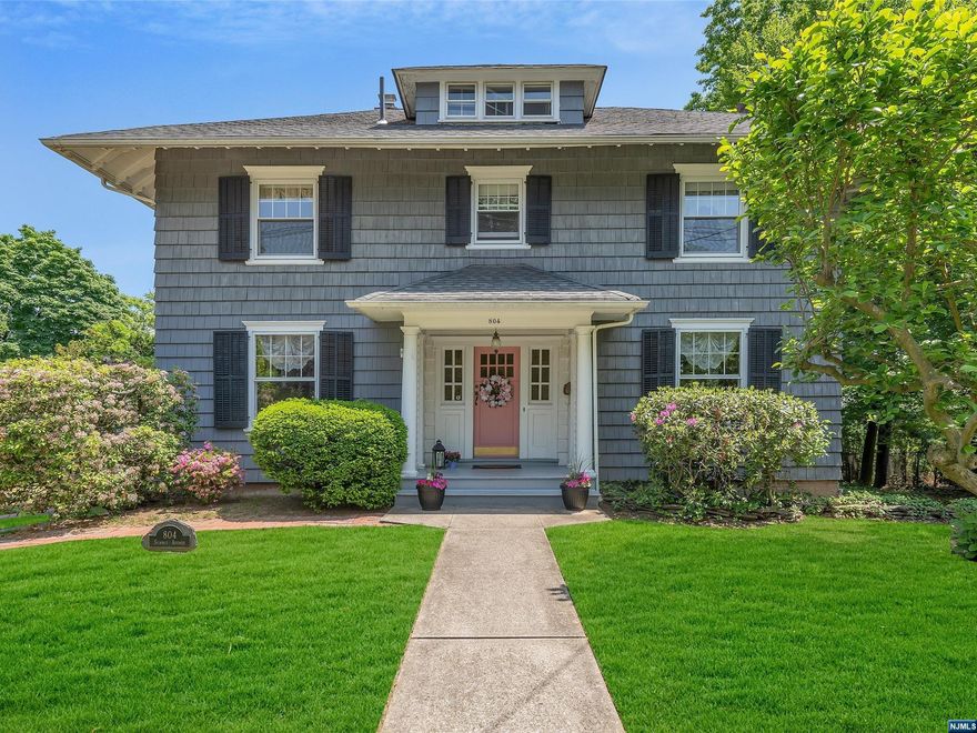 Located on an alluring & coveted street, this stunning CH Colonial, a Stanford White creation, boasts an abundance of charm & curb appeal. The front porch entry thru the original Dutch door gives a glimpse of the surprises that await. Special features include period architectural details including a grand curved staircase, exquisite wood molding, pocket drs & inlaid flooring in the LR w/Brick FPL & DR featuring a curved ceiling & built-in china cabinet. Custom Kitchen w/Hickory cabinetry, granite counters, subway tile black splash, dbl cl & access to yard. Back hall leads to the Pdr Rm & Fam Rm w/dbl French drs to the LR. The 2nd flr presents 3 BRs, one is the Primary w/3 cls, Full Bath w/pedestal sink, & rear screened-in porch. Finished 3rd flr with play rm/office & stge. In addition, there's a lrg walk-out basement w/exposed brick walls that is being used and enjoyed. Newer above ground oil tank. Beautiful gardens w/2 ponds. Sought after RE Schools- Close to all & NYC Transp.