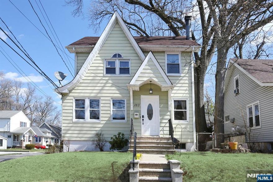 This beautifully updated home boasts 3 bedrooms and 2 baths and is located in one of Dumont's most desirable neighborhoods. This charming property offers a delightful mix of modern improvements and classic character, making it truly move-in ready. As you step inside, you'll be welcomed by a bright and inviting living room with a fireplace, perfect for those cozy evenings. The modern kitchen has stylish countertops, stainless appliances, and ample cabinet space, seamlessly connecting to the dining room, which is ideal for entertaining guests. Upstairs there are three spacious bedrooms, stairs leading to a finished attic which could serve as a 4th bedroom or play area. The fully finished basement expands the living area, making it perfect for a media room, gym, or guest suite. Outside has a newer deck, detached garage and spacious yard. With it's great location, modern upgrades, and undeniable charm, this home is sure to attract buyers. Just pack your bags and prepare to fall in love!