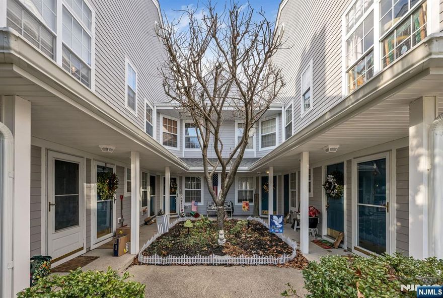 Welcome to this inviting, one-level, corner unit townhouse in the sought-after Paddington Square community, offering no stairs and beautifully maintained interiors throughout. The bright living room features a cozy gas fireplace and sliders leading to the outdoors, perfect for relaxing or entertaining. An open dining area connects to the updated kitchen, complete with quartz countertops and stainless steel appliances installed just five years ago. The modern bathroom, renovated four years ago, includes a stylish stall shower with glass doors. Additional peace of mind comes with a new hot water heater installed in 2023. A dedicated parking space (#100) adds convenience. This move-in-ready, no-steps townhouse is the ideal blend of comfort and convenienceâ€”your opportunity in Paddington Square awaits!