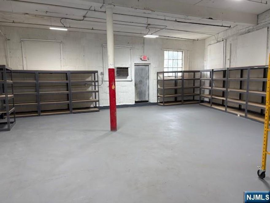 WAREHOUSE/STORAGE SPACE WITH HIGH CEILINGS CENTRALLLY LOCATED IN HACKENSACK. (1) BAY USAGE. NNNS additional rent plus utilities Approx. 1700 p/month plus shared utilities