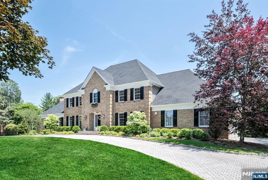 Simply perfect! Located in Lily Pond Estates, Completely renovated inside and out to an extremely high standard. This classic and timeless center hall colonial offers high ceilings, new front door, new roof, new Trex deck, new paving stone patios surrounding the recently refinished Gunite pool, new landscaping and new fencing. The interior showcases all new baths, completely update kitchen, new appliances, Viking stove, new Viking refrigerator, new quartz counter tops, newly designed mud room, gleaming hardwood floors t/0, new porcelain floors in the foyer and kitchen. The family room with trayed ceiling offers all new moldings and fireplace surround plus a new wet bar with wine ref. and ice maker. The refinished lower level offers a recreation room with a new floor, gym with a new floor, cedar closet and storage. This home is conveniently located to shopping and the Indian Trail Club, complete with amenities . Enjoy Franklin Lakes award winning schools.