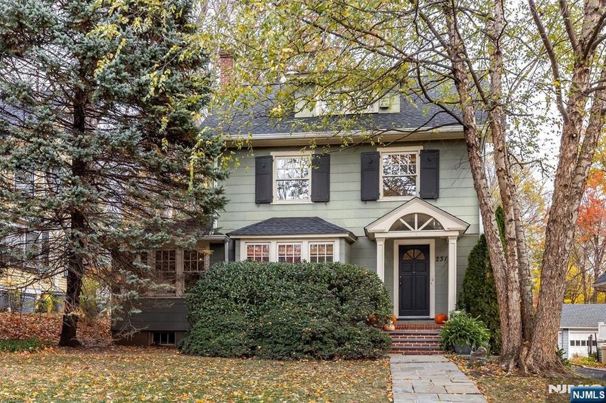 Sweet as pie on Washington Street, this inviting Colonial will have you Giving Thanks year-round. The spacious first floor features beautiful hardwood floors throughout the living and dining rooms, plus a den and family room, offering flexible spaces for work, play, or relaxation. The updated kitchen features all stainless steel appliances, including a professional-grade Viking stove and a GE refrigerator replaced in 2020. The kitchen opens to a newly rebuilt deck (2025) overlooking an impressively deep, private yard with a sprinkler system perfect for outdoor entertaining. Upstairs you'll find three comfortable bedrooms and a full bathroom. One bedroom includes a walk-in closet, while two connect through an adjoining door for a convenient layout. The expansive third floor serves as a versatile living area currently used as a primary suite with ample storage. The unfinished basement includes a laundry area, canning room, and a toilet + sink with potential to become an additional bathroom. Additional highlights include central air conditioning, a roof replaced in 2022, and a newly redone driveway (2025). Ideally located just minutes from Glen Ridge public schools, NJ Transit Midtown Direct train service from both Glen Ridge and Bloomfield Stations, as well as parks, restaurants, grocery stores, and entertainment options aplenty.