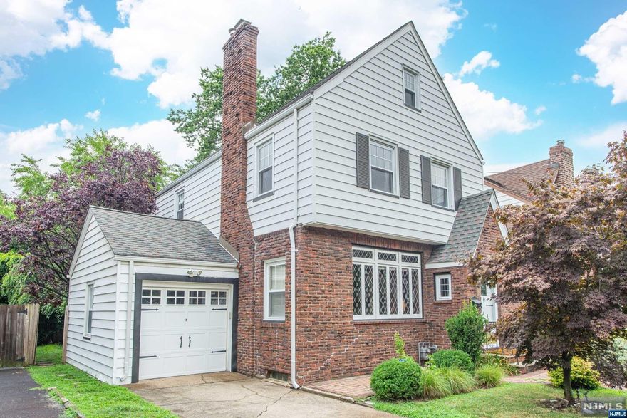 Discover this fantastic 3-bedroom, 2-bathroom home in the heart of the Brookdale Park neighborhood. Open the door from the vestibule to the living room and you'll be wowed by 9 ft ceilings and unique, pecky cypress walls; a rare wood with natural pockets and grooves that adds character and warmth to the space. There's a formal dining room and just beyond; great work from home space. Recently renovated kitchen completes the first floor. Upstairs 3 really good sized bedrooms including super spacious primary. The hall bath is enormous and has generous shower, separate tub and so much space. Basement is all done with high ceilings, second area to work from home, great tv hangout or games space and a recently renovated, gorgeous full bath. Situated in the sought-after Brookdale Park neighborhood, 45 Overlook Ter is around the corner from the much loved Brookdale Elementary School, down the street from gorgeous, 219 Brookdale Park. Easy in to NYC on public transportation