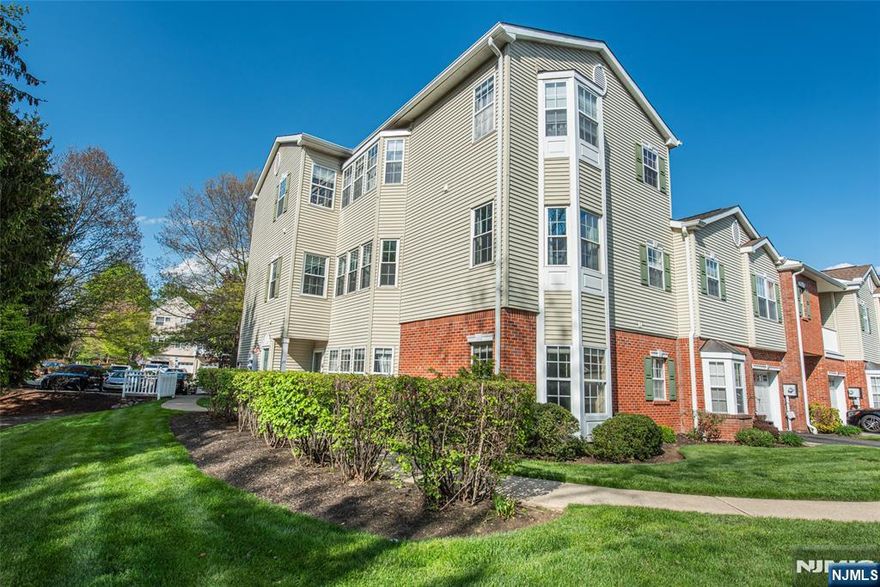 Set within Hunting Meadows, this first floor condo offers a spacious, single-level layout with no steps for easy, seamless living. The main living area is bright and open, with large windows bringing in consistent natural light and a clean, cohesive flow into the dining space. The kitchen has been updated with new resurfaced cabinetry, granite countertops, a new backsplash, a full stainless steel appliance package and a pantry for storage. A breakfast bar connects the space, creating a functional layout and has room for three barstools. Both bedrooms feature new vinyl flooring, including a well-sized primary suite with a fully customized California Closet. The primary bathroom has been completely renovated with high-end finishes that cost $45K, including heated flooring, a heated infrared fan, a 7-foot glass-enclosed shower, a freestanding tub, and a custom vanity with added storage, including built-in cabinetry above the toilet. The second bedroom also includes a custom California Closet system. Additional updates include a new hot water heater with automatic shutoff and a new washer, along with a dedicated laundry area for added convenience. For added convenience and functionality, this condo comes with a detached garage! The home is set within a well-maintained community just minutes from Lincoln Park Station (NYC transportation), major highways, shopping, and walking distance to everyday amenities.
